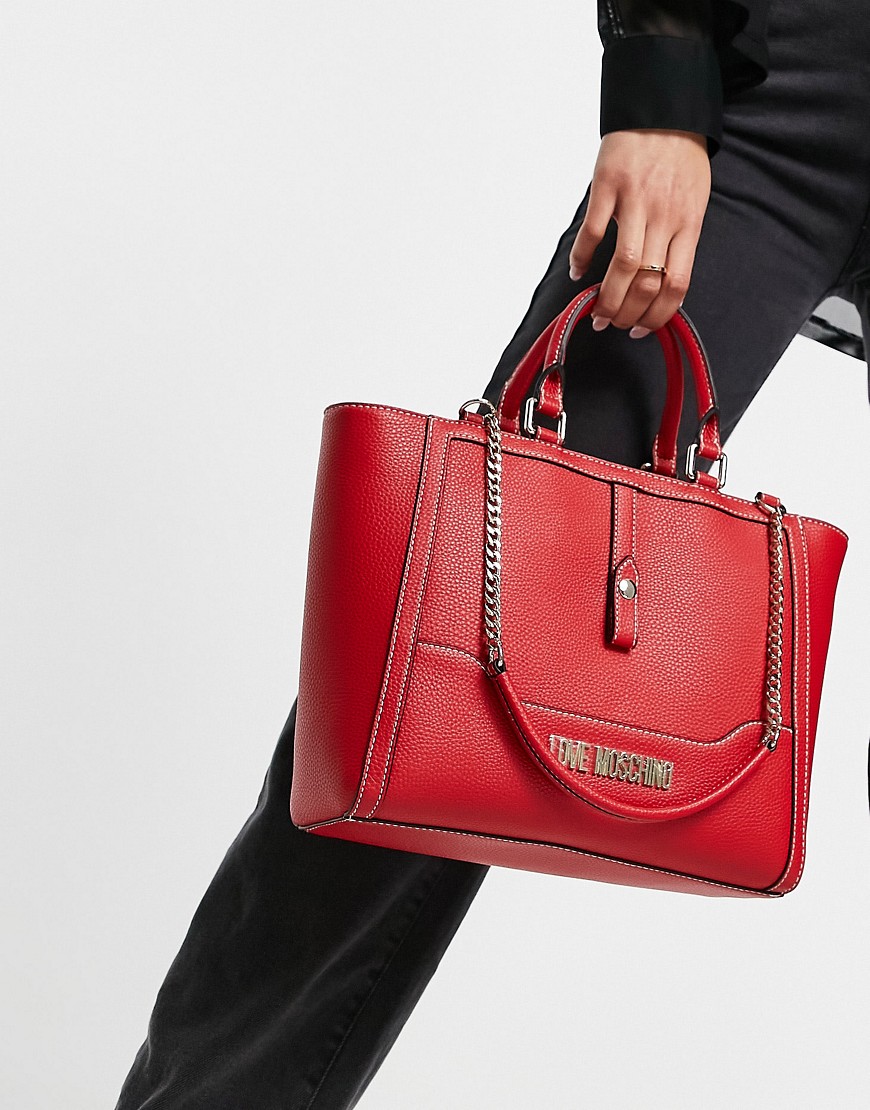фото Красная сумка для путешествий love moschino-красный