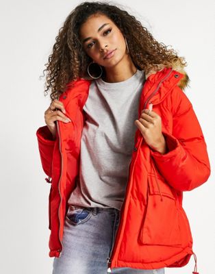 фото Красное пальто с капюшоном и отделкой искусственным мехом the couture club-красный
