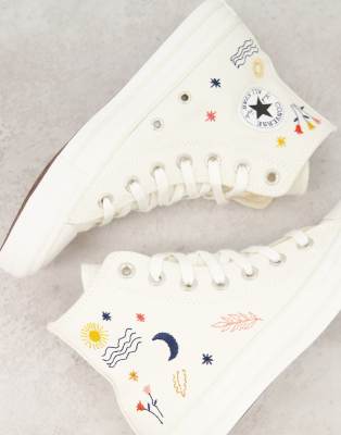 фото Кремово-белые высокие кеды с вышивкой converse chuck taylor all star-белый