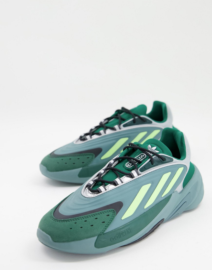 фото Кроссовки зеленого и приглушенного изумрудного цвета adidas originals ozelia-зеленый цвет