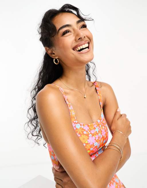 Kulani Kinis x Hannah Meloche Ava Jules adjustable strap swimsuit in orange ditsy floral print