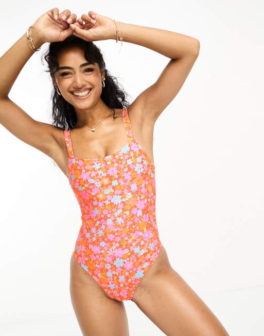 Kulani Kinis x Hannah Meloche & Ava Jules adjustable strap swimsuit in  orange ditsy floral print