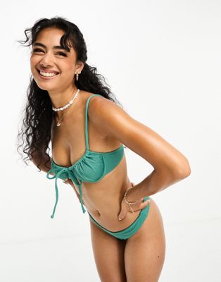 Kulani Kinis x Hannah Meloche & Ava Jules ribbed ruched underwire bra bikini top in sage green - ASOS Price Checker