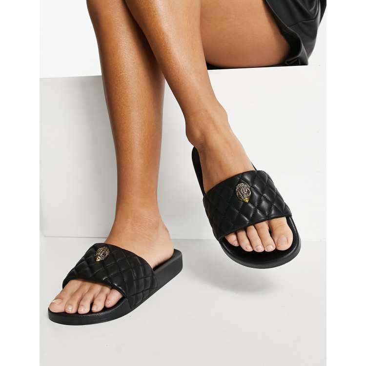 Kurt Geiger London Meena slider with eagle trim in black quilt