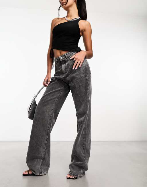 Jeans con strass sulle tasche top