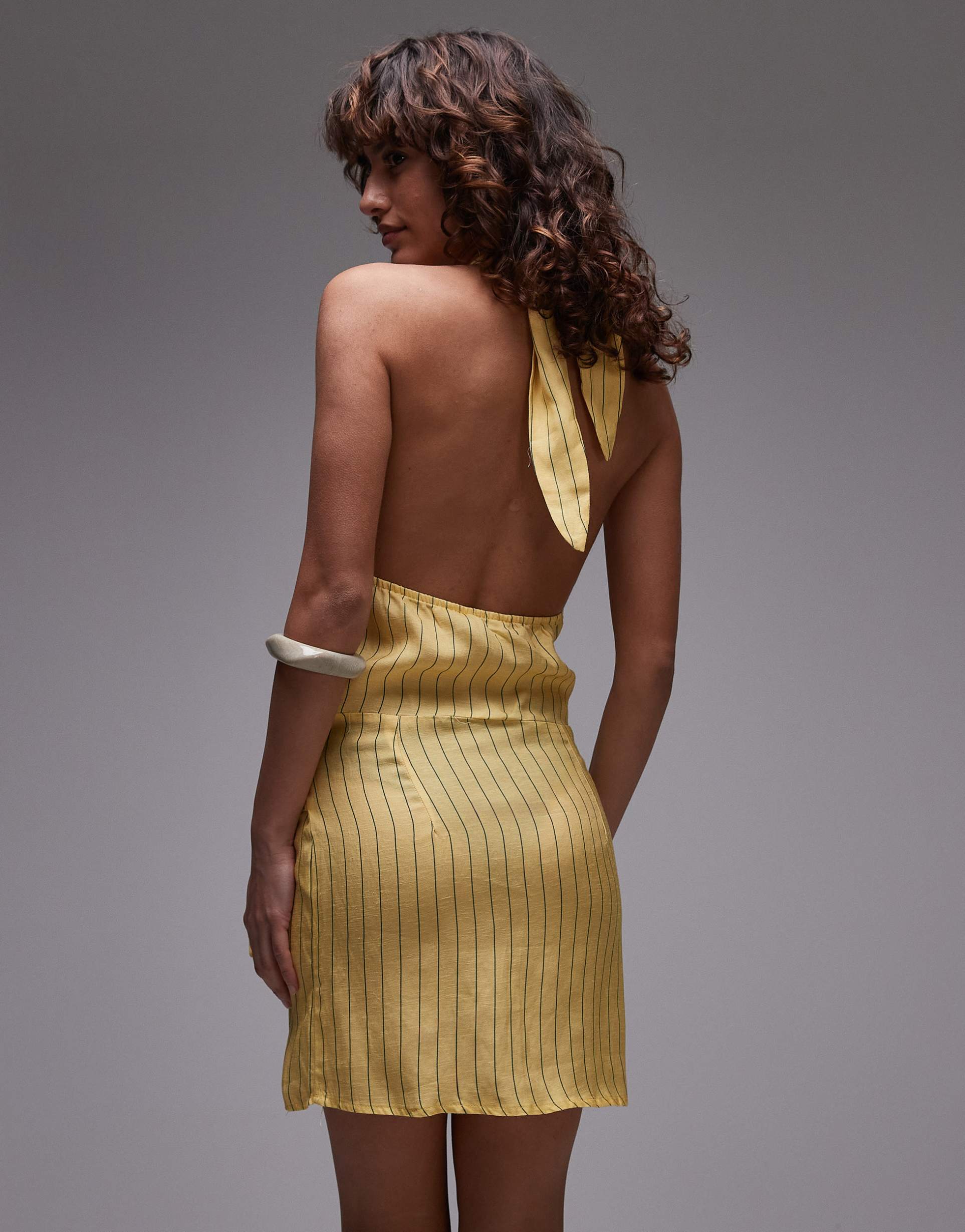 laagam amazona uma striped mini dress in yellow