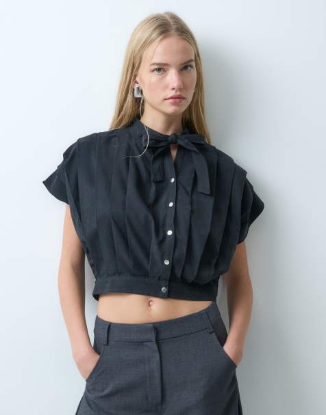 Laagam Kora pleated short sleeve blouse in black - view 1