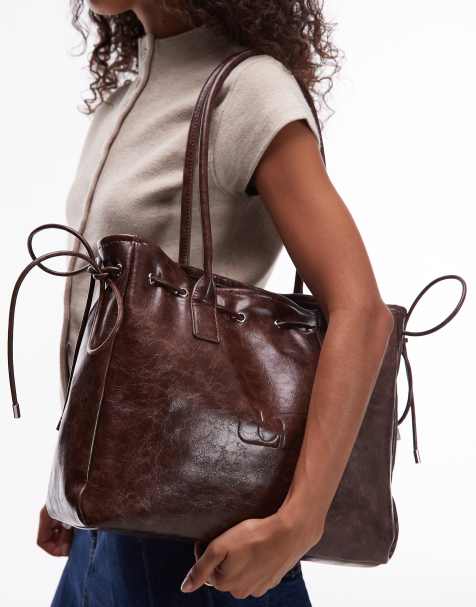 LAAGAM Robbin multi pocket faux leather bag in brown - view 1