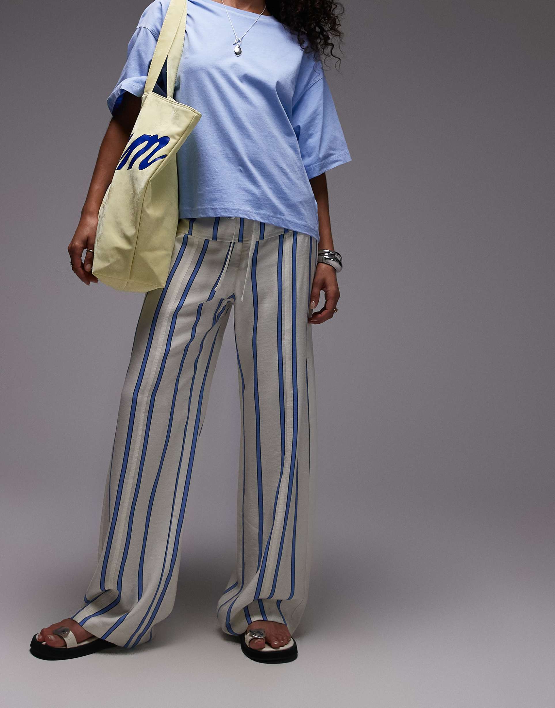 laagam tashi striped flow pants in ecru and blue