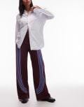 [Laagam] LAAGAM Zion midrise straight leg trackpants with curved contrast piping in burgundy-Red 32 BURGUNDY