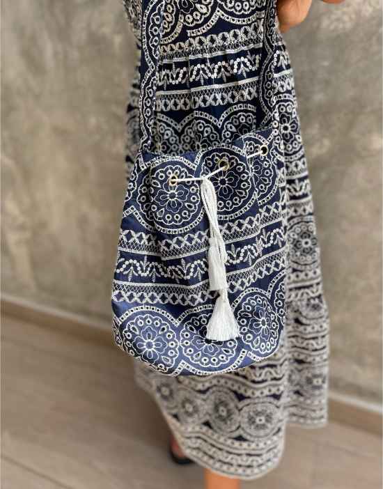 https://images.asos-media.com/products/labelrail-x-collyer-twins-drawcord-bag-in-navy-broderie/202194741-3?$n_550w$&wid=550&fit=constrain
