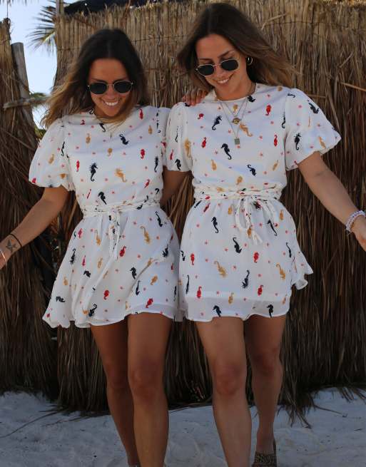 Labelrail x Collyer Twins mini puff sleeve dress in seahorse print