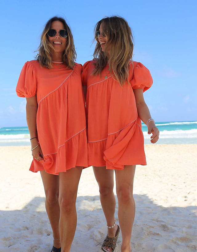 Labelrail x Collyer Twins mini smock dress with asymmetric seam detail in washed orange GN10969