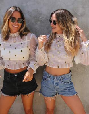 Labelrail x Collyer Twins shirred cropped blouse with sunflower embroidery in white