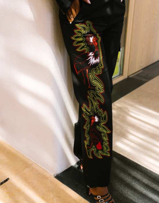 https://images.asos-media.com/products/labelrail-x-eva-apio-crane-bird-embroidered-cargo-pants-in-black/202361487-2?$n_550w$&wid=550&fit=constrain