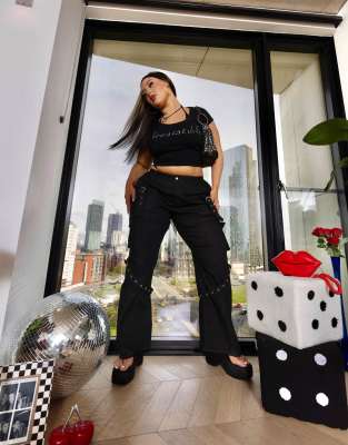 Labelrail x Holly Marston utility hardware denim jeans in black - ASOS Price Checker