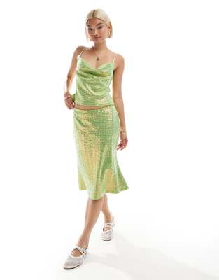 Labelrail Labelrail x Olivia Grace Herring sequin flippy knee length midi skirt co-ord in green