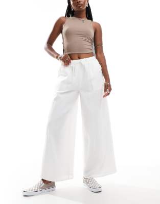 Labelrail Labelrail x Olivia Grace Herring wide leg low rise textured trousers in white