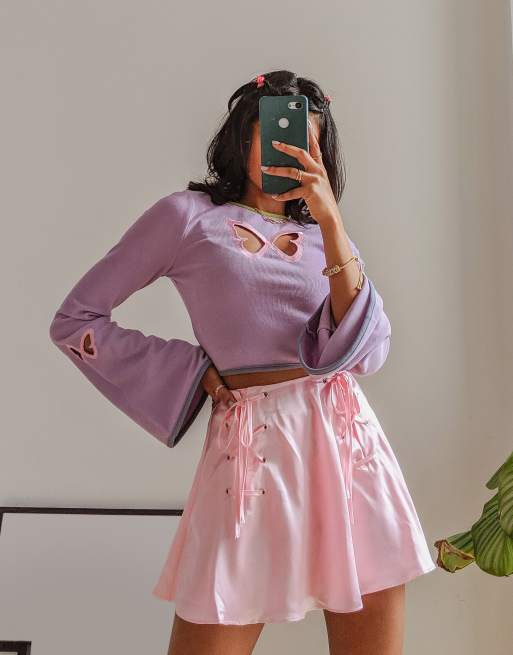 Labelrail x Pose and Repeat – Crop top med långa ärmar och utskurna fjärilsdetaljer