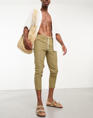 Labelrail x Stan & Tom tapered drawstring linen chinos in olive - ASOS Price Checker