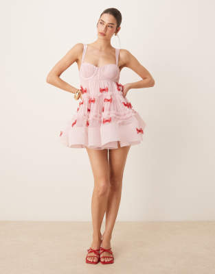 bow applique babydoll mini dress in pink and red