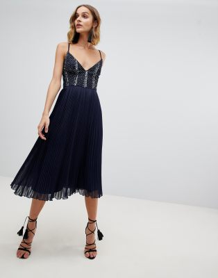 navy dress with pleated skirt