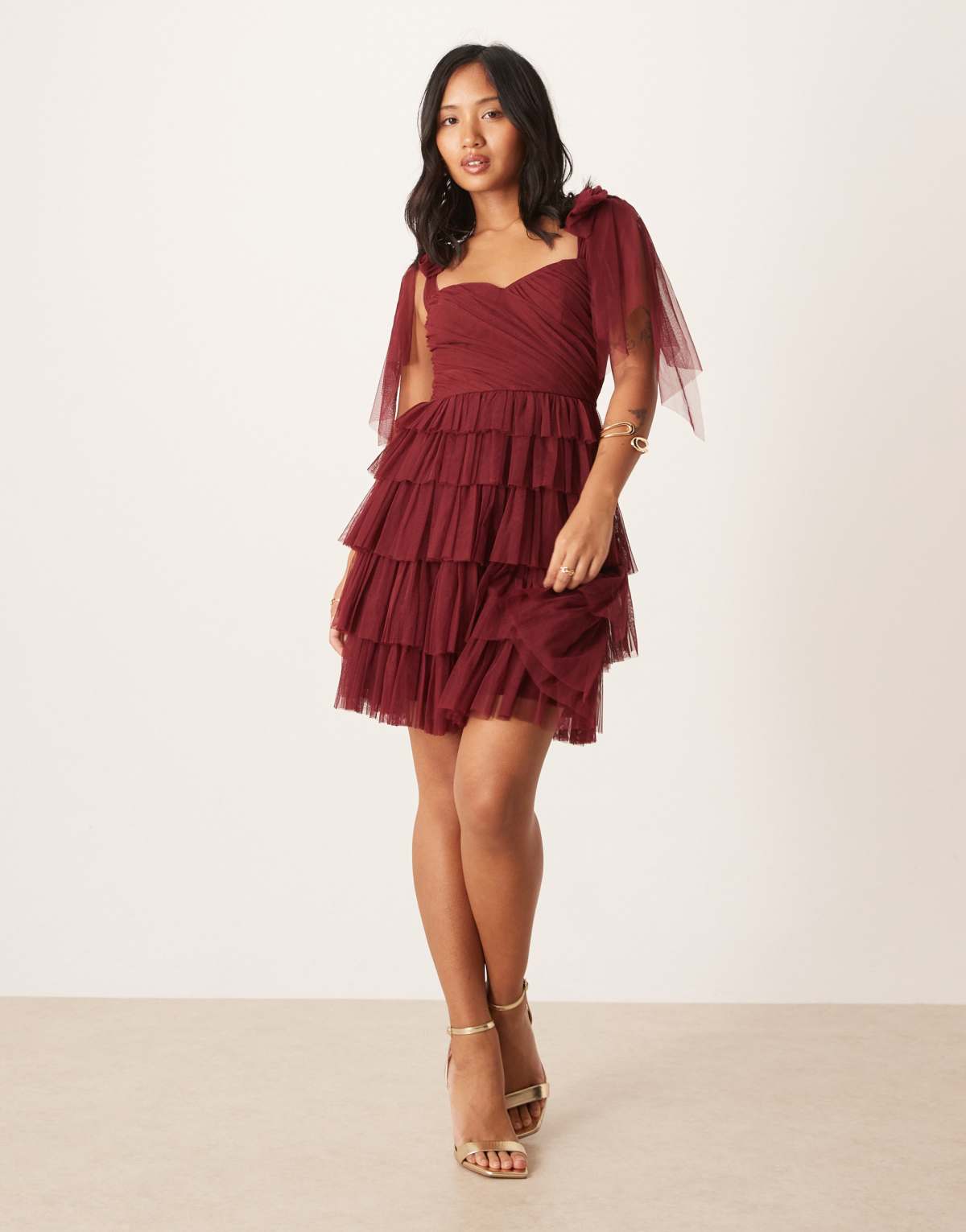 Lace & Beads Petite bow shoulder tulle ruffle mini dress in burgundy