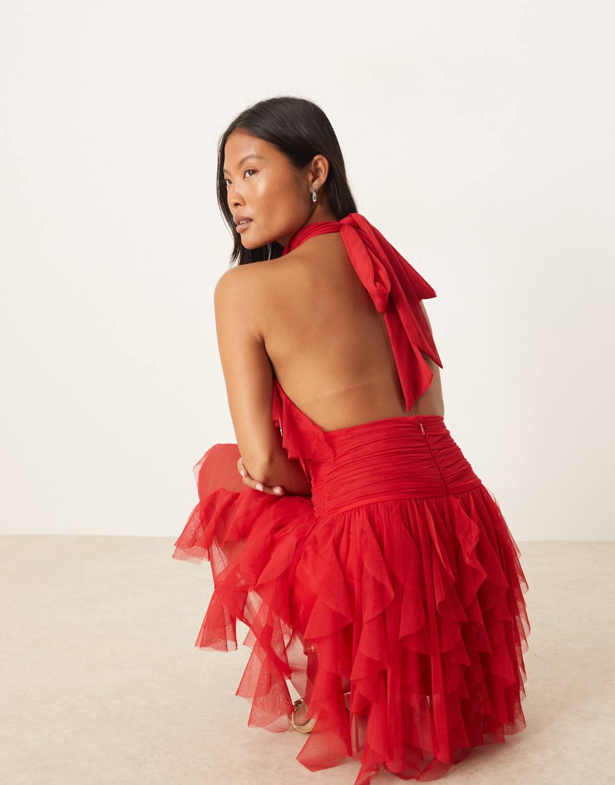 Lace & Beads Petite ruffle halter drop hem mini dress in red