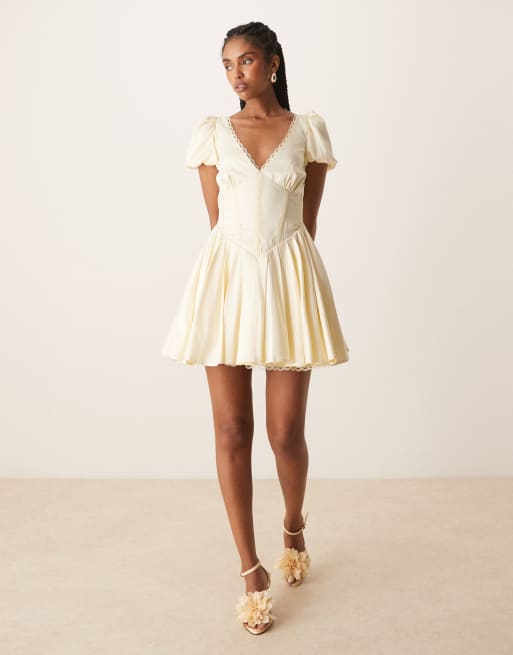 Lace & Beads puff sleeve satin corset mini dress in butter yellow