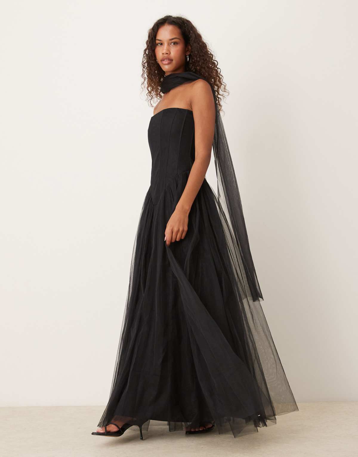 Lace & Beads strapless drop hem corset maxi gown with neck scarf in black