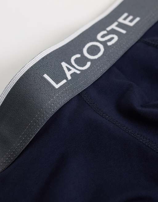 Lacoste 3 pack coloured waistband trunks in navy and grey, 2 of 3