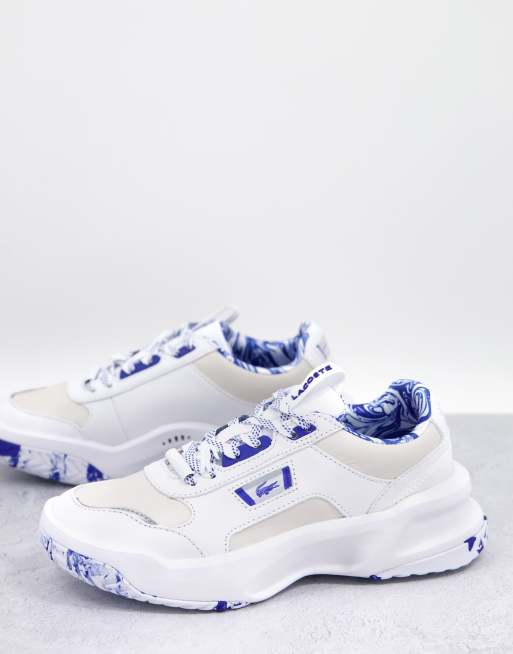 Lacoste Ace Lift leather chunky marble trainers in white and blue