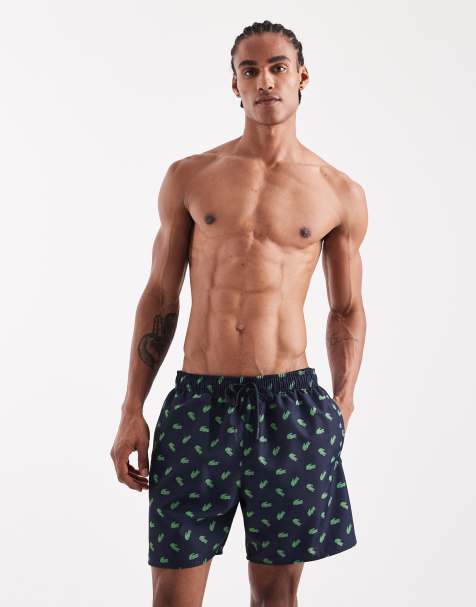 Lacoste all over croc logo swim shorts in navy - view 1
