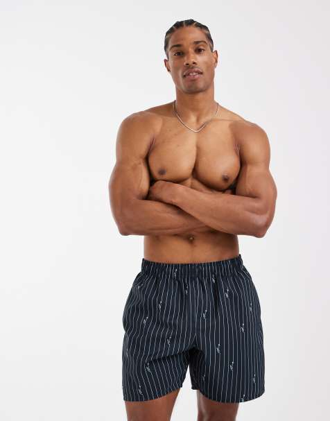 Lacoste all over croc stripe swim shorts in black - view 1