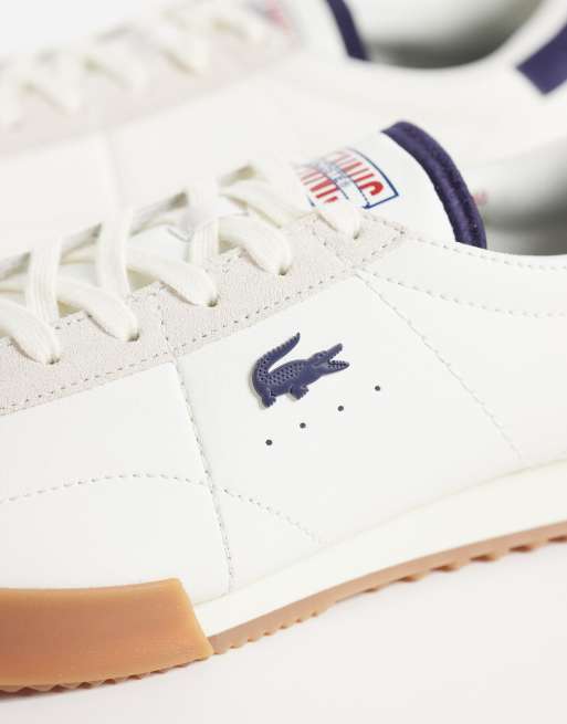 Lacoste Aura gumsole sneakers in navy and white, 4 of 5