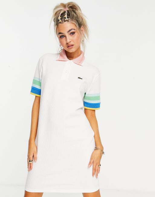 Lacoste – Biała sukienka polo z kolorowymi wstawkami