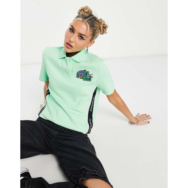 Polo lacoste logo store grande