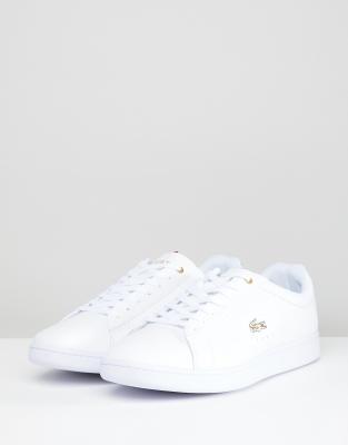 lacoste shoes gold logo