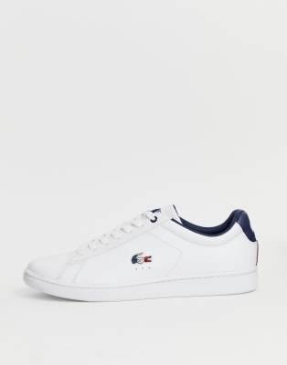 white lacoste golf shirt