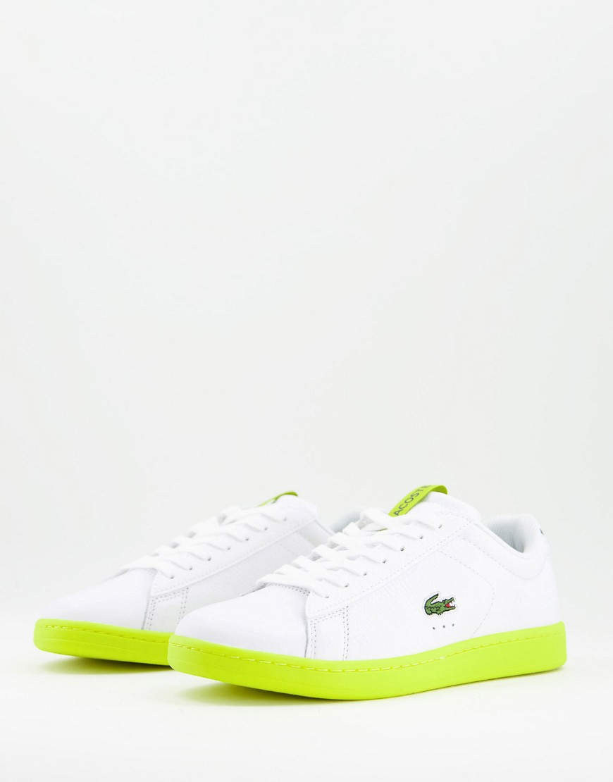 Lacoste carnaby lace up sneakers in white and yellow