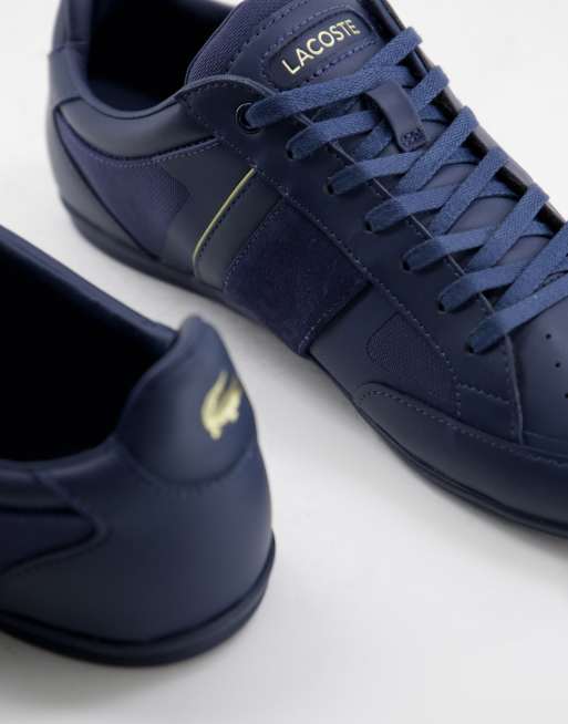 Lacoste Chaymon Tech Sneakers in marineblauw goud ASOS