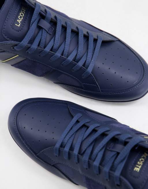 Lacoste chaymon tech sneakers in navy gold