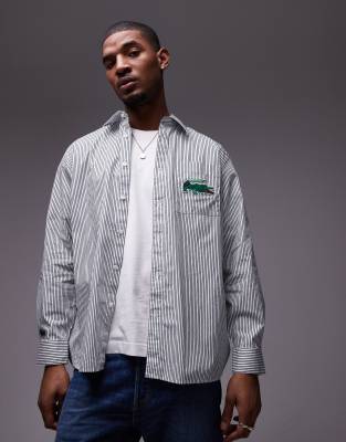 Lacoste - Chemise manches longues rayée à logo - Vert