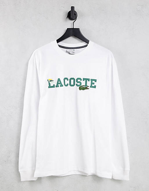 Men Lacoste chest logo long sleeve top in white 