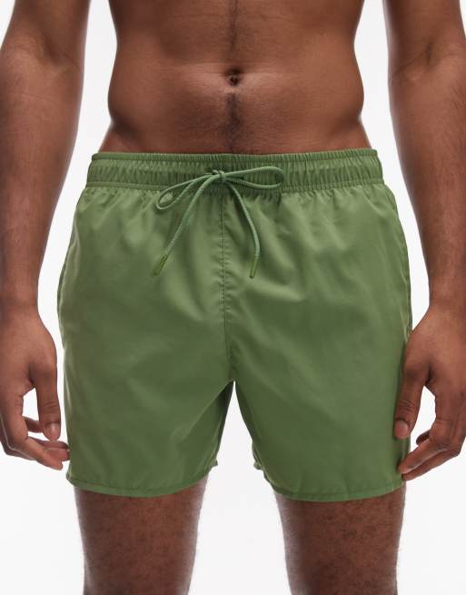 Lacoste classic logo swim shorts in green , 5 of 5