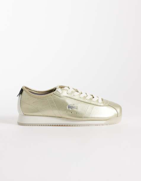 Lacoste Club-Low metallic logo trainers in gold - view 1