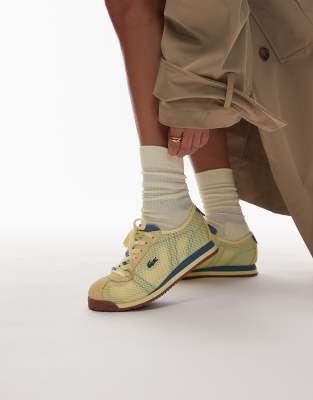 Lacoste - Club - Niedrige Netzstoff-Sneaker in Hellgelb