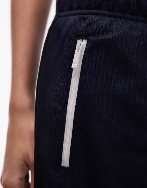 Lacoste co-ord sports skirt with zip detail in navy, 4 of 5