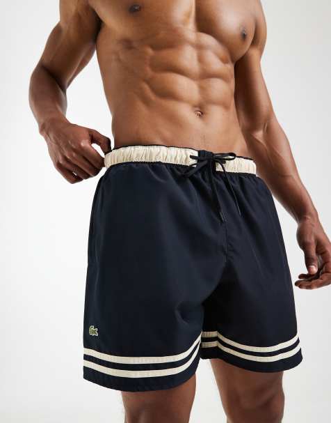 Lacoste contrast stripe swim shorts in black & ecru - view 1