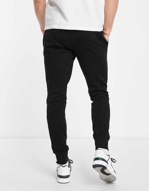 Lacoste cotton trackies in black